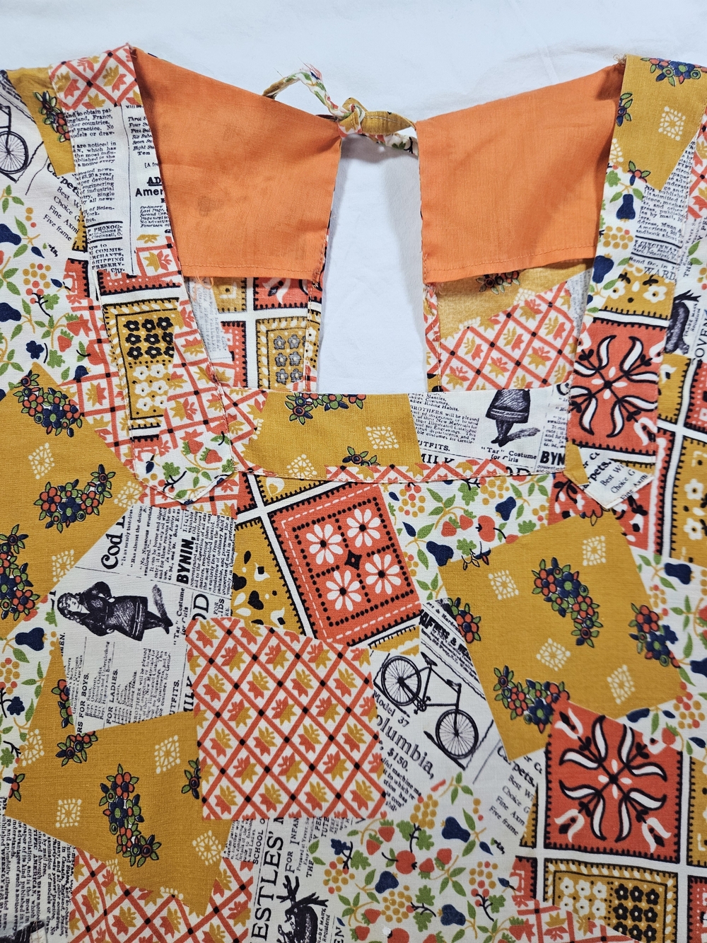 Women's 70s Patchwork Newspaper Print Tunic Top Apron Jacket in Mustard & Orange - Picture 2 of 14